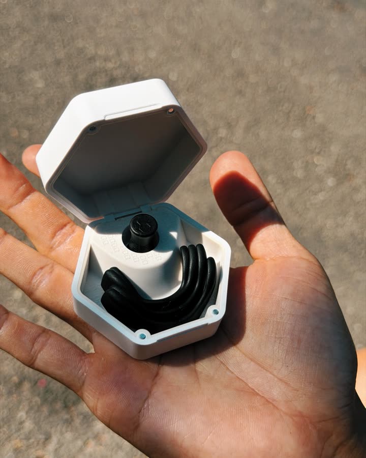 Intake nasal strip case open in a hand